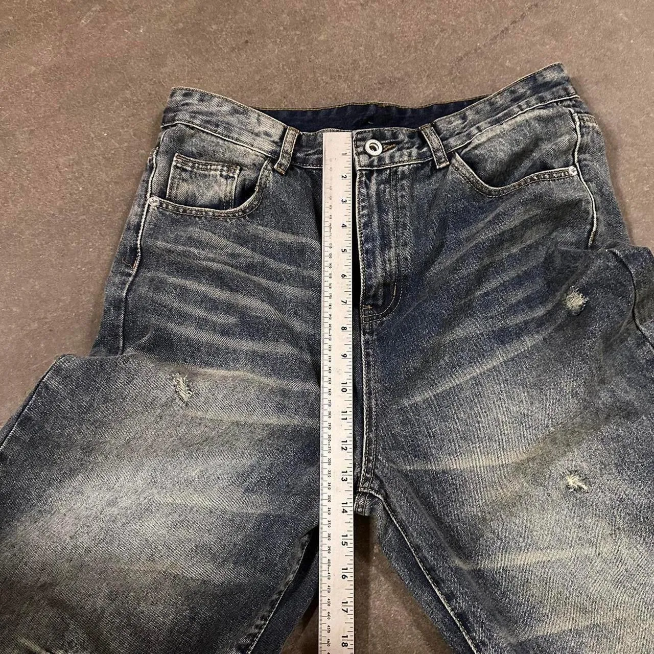 Distressed blue denim