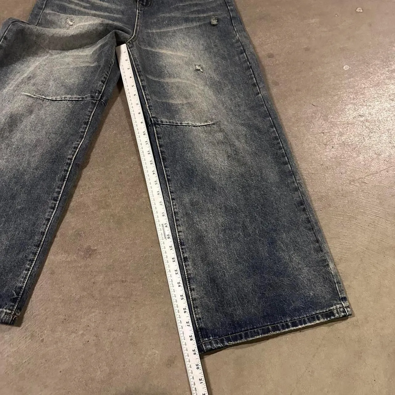 Distressed blue denim