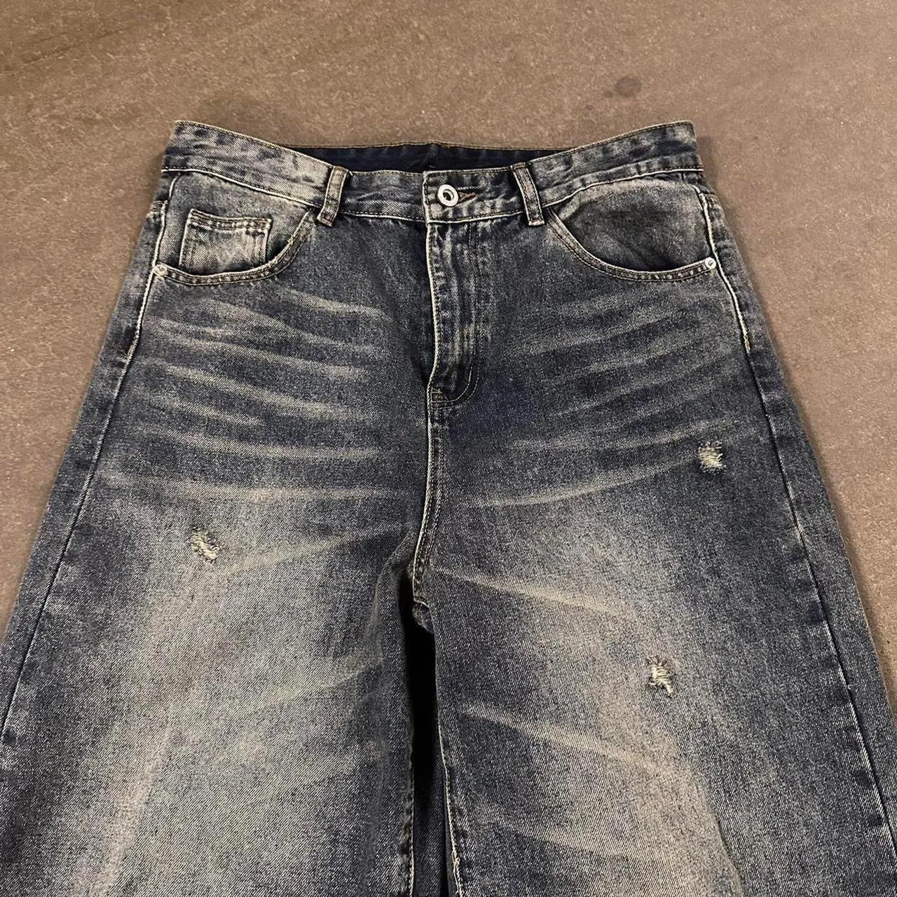 Distressed blue denim