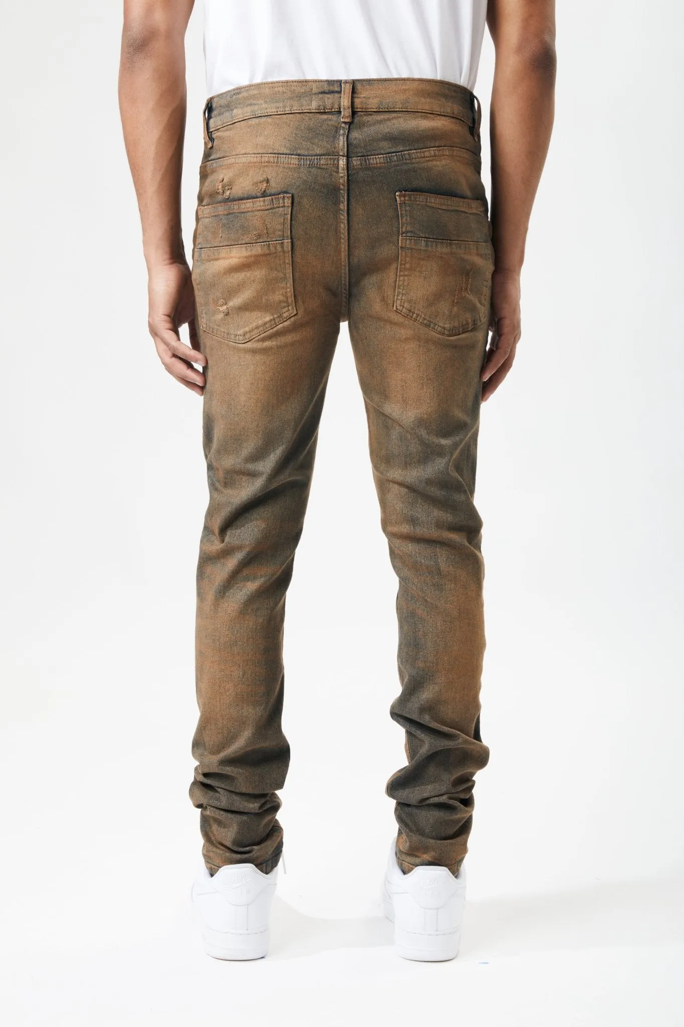Ripped and Repaired Denim Jeans in Timber