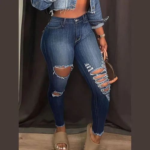 'Treasure' Distressed Skinny Jeans